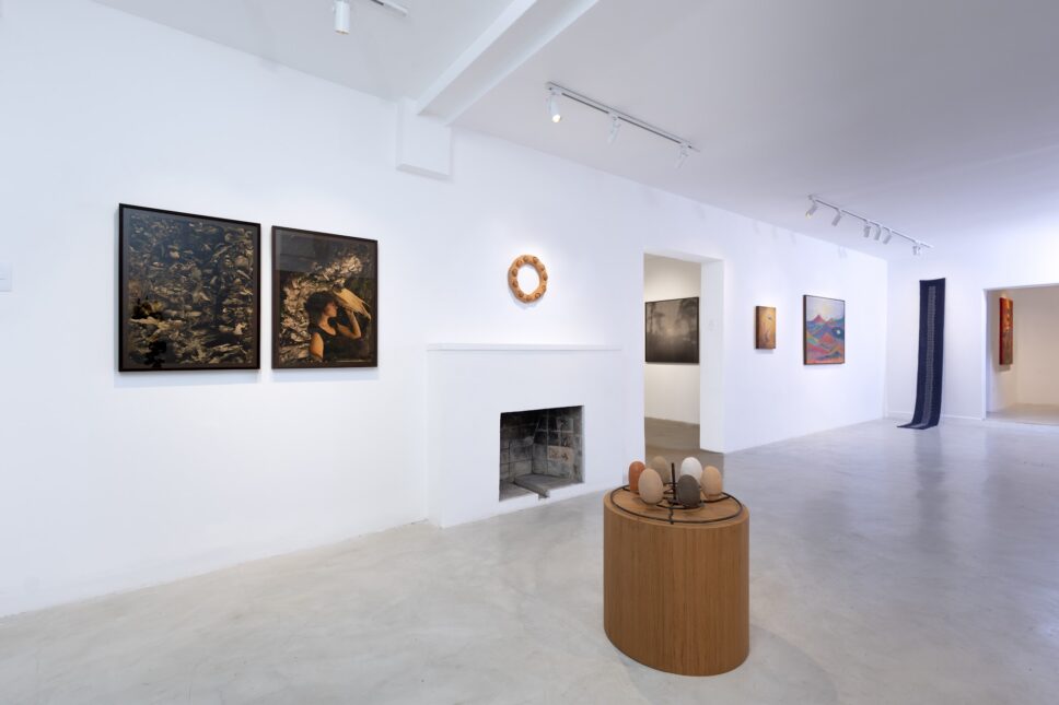 Group exhibition at Ateliê Casa Um, São Paulo, with paintings, sculptures and Study of the Sun I, a black-and-white film photograph by Emilia Brandão Carneiro