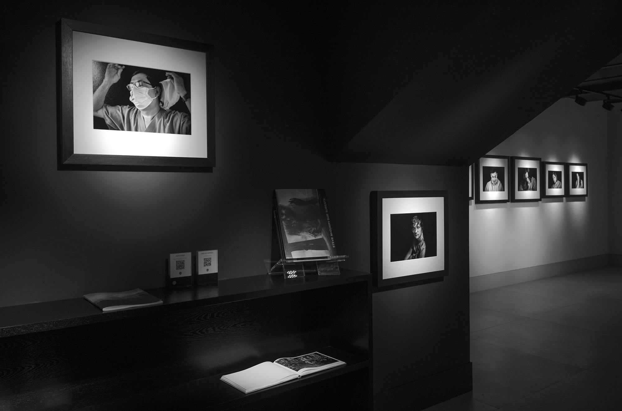black-and-white portraits of healthcare professionals in Emilia Brandão Carneiro’s El Tiempo de Cura exhibition at Leica Gallery Madrid